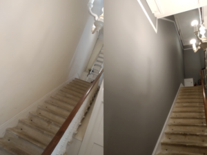 Staircase walls transformed from bare plaster to smooth grey finish, before and after